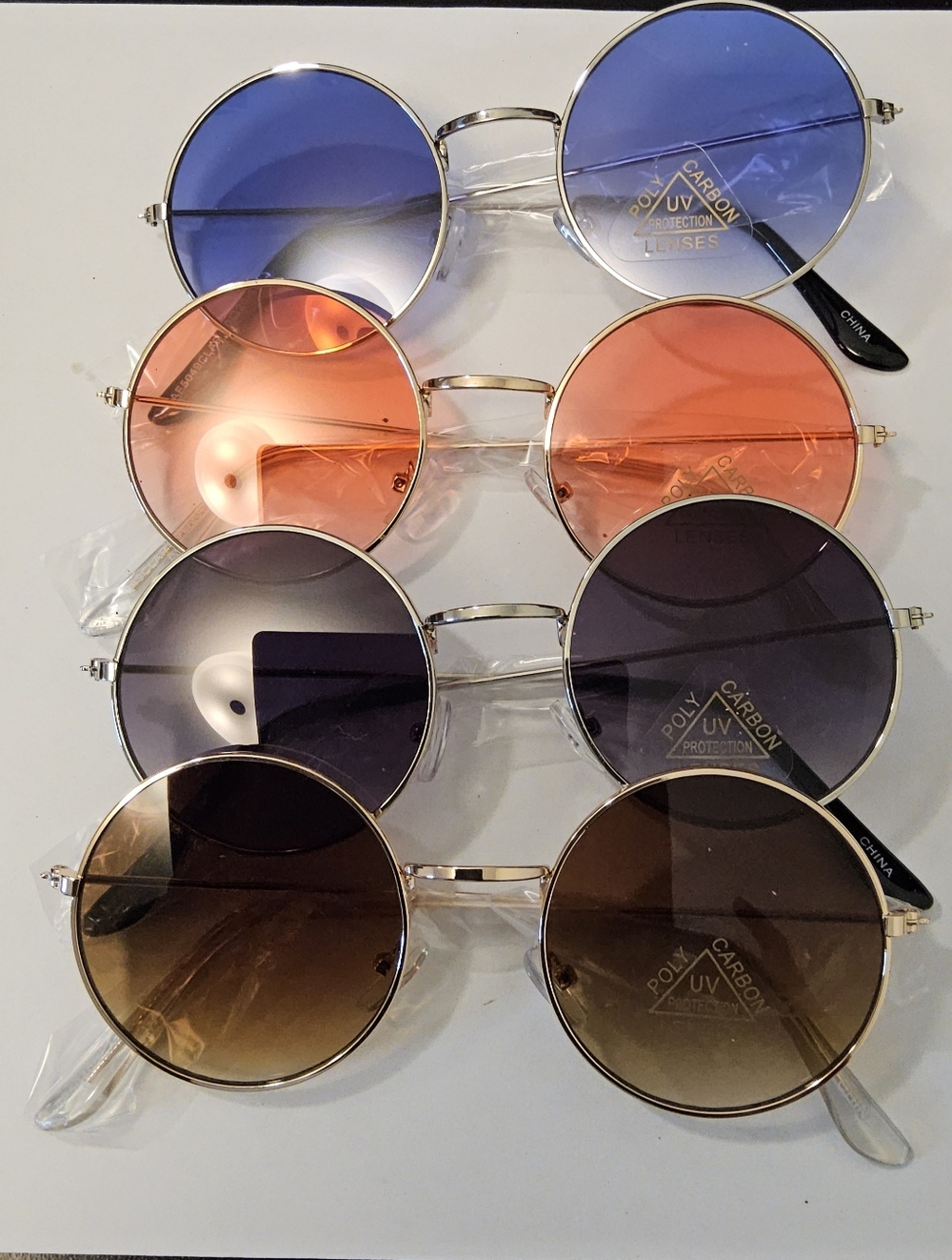 E. Set Of 4 Round Retro Sunglasses Pack